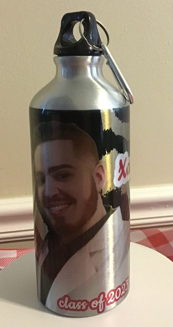 A water bottle with a picture of a man on it.