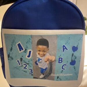 A backpack with a picture of a child on it.