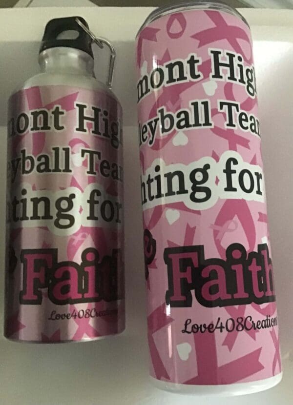 A pink bottle and a pink water bottle with the words " faith " on it.